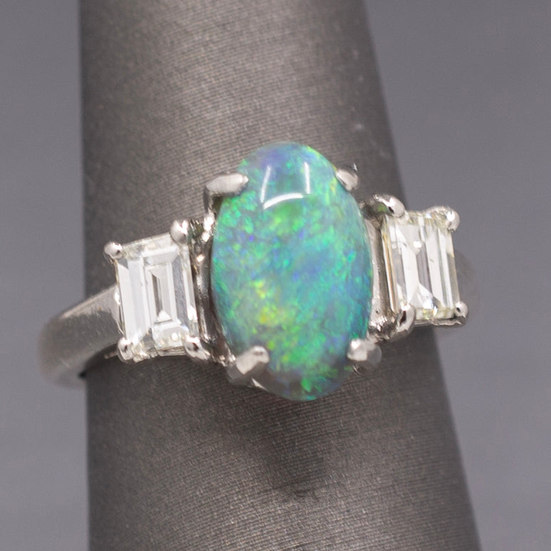 Exquisite Black Opal and Trapezoid Cut Diamond Three Stone Ring in Platinum