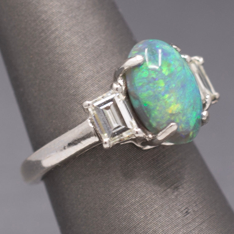 Exquisite Black Opal and Trapezoid Cut Diamond Three Stone Ring in Platinum