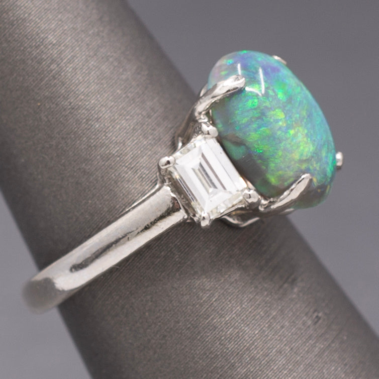 Exquisite Black Opal and Trapezoid Cut Diamond Three Stone Ring in Platinum