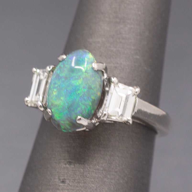 Exquisite Black Opal and Trapezoid Cut Diamond Three Stone Ring in Platinum