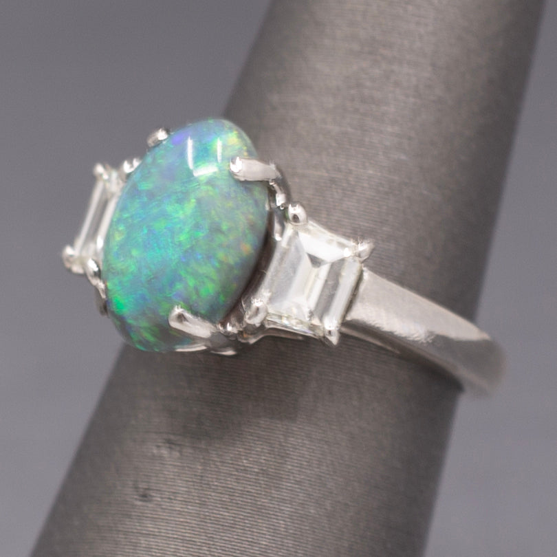 Exquisite Black Opal and Trapezoid Cut Diamond Three Stone Ring in Platinum