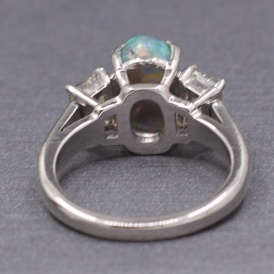 Exquisite Black Opal and Trapezoid Cut Diamond Three Stone Ring in Platinum