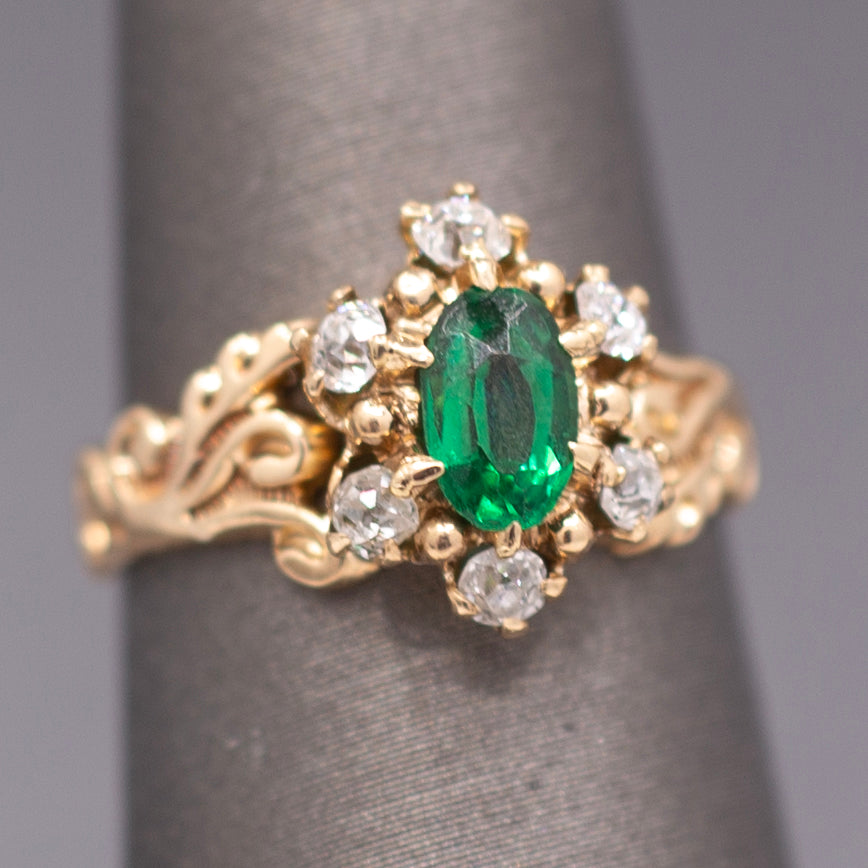 Victorian Oval Cut Emerald and Old Mine Cut Diamond Ring in Rosy Gold