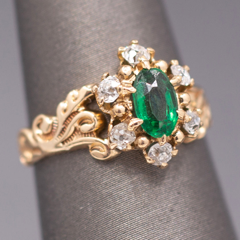 Victorian Oval Cut Emerald and Old Mine Cut Diamond Ring in Rosy Gold