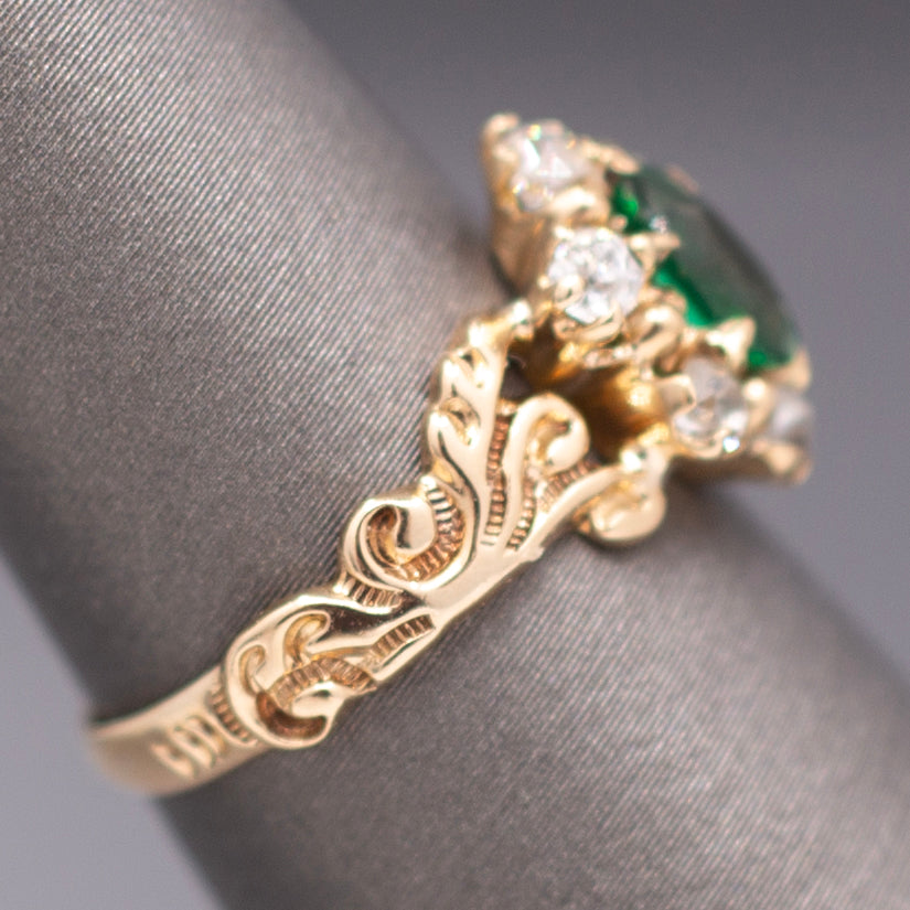 Victorian Oval Cut Emerald and Old Mine Cut Diamond Ring in Rosy Gold