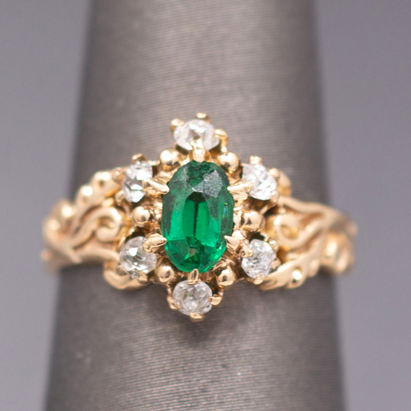 Victorian Oval Cut Emerald and Old Mine Cut Diamond Ring in Rosy Gold