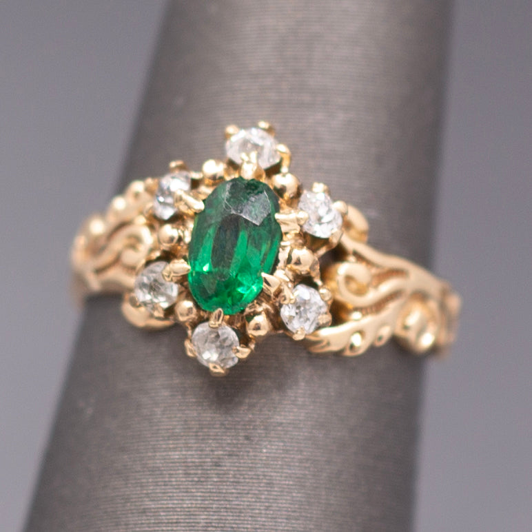 Victorian Oval Cut Emerald and Old Mine Cut Diamond Ring in Rosy Gold