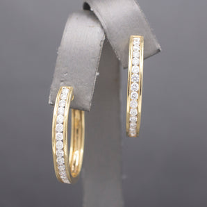 Sparkling Channel Set Diamond Oval Hoop Earrings in 14k Yellow Gold 1.95cttw
