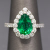 Exquisite GIA Certified Pear Cut Emerald and Diamond Halo Ring in 18k White Gold