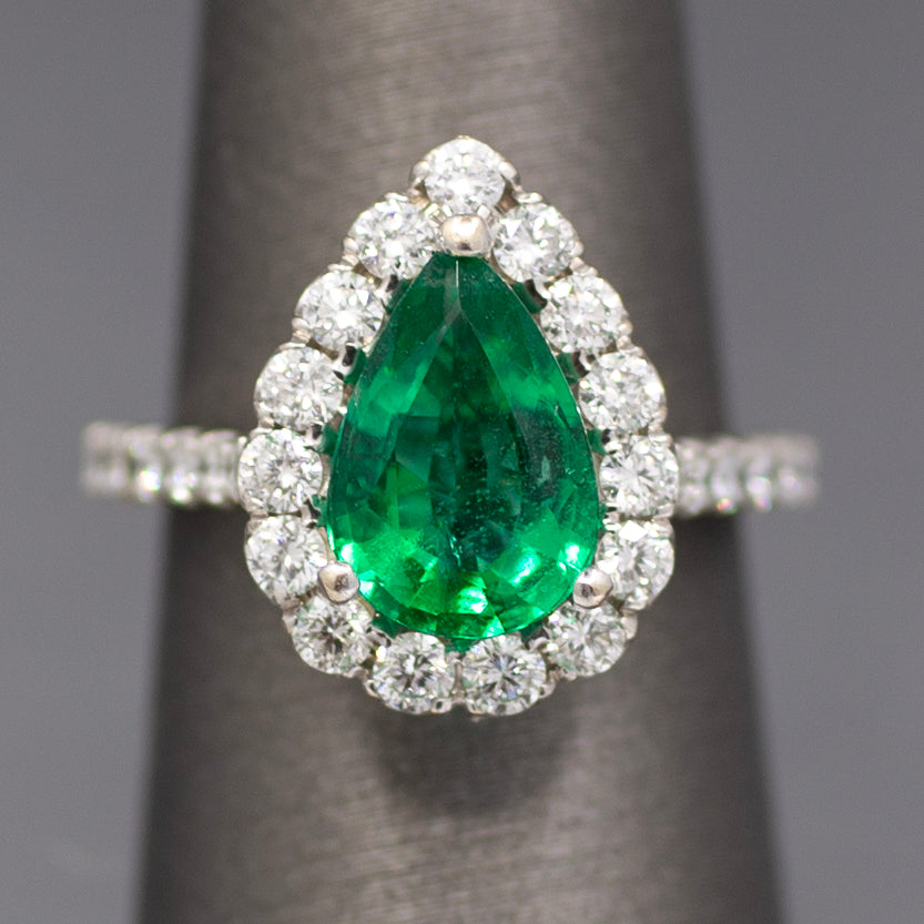 Exquisite GIA Certified Pear Cut Emerald and Diamond Halo Ring in 18k White Gold