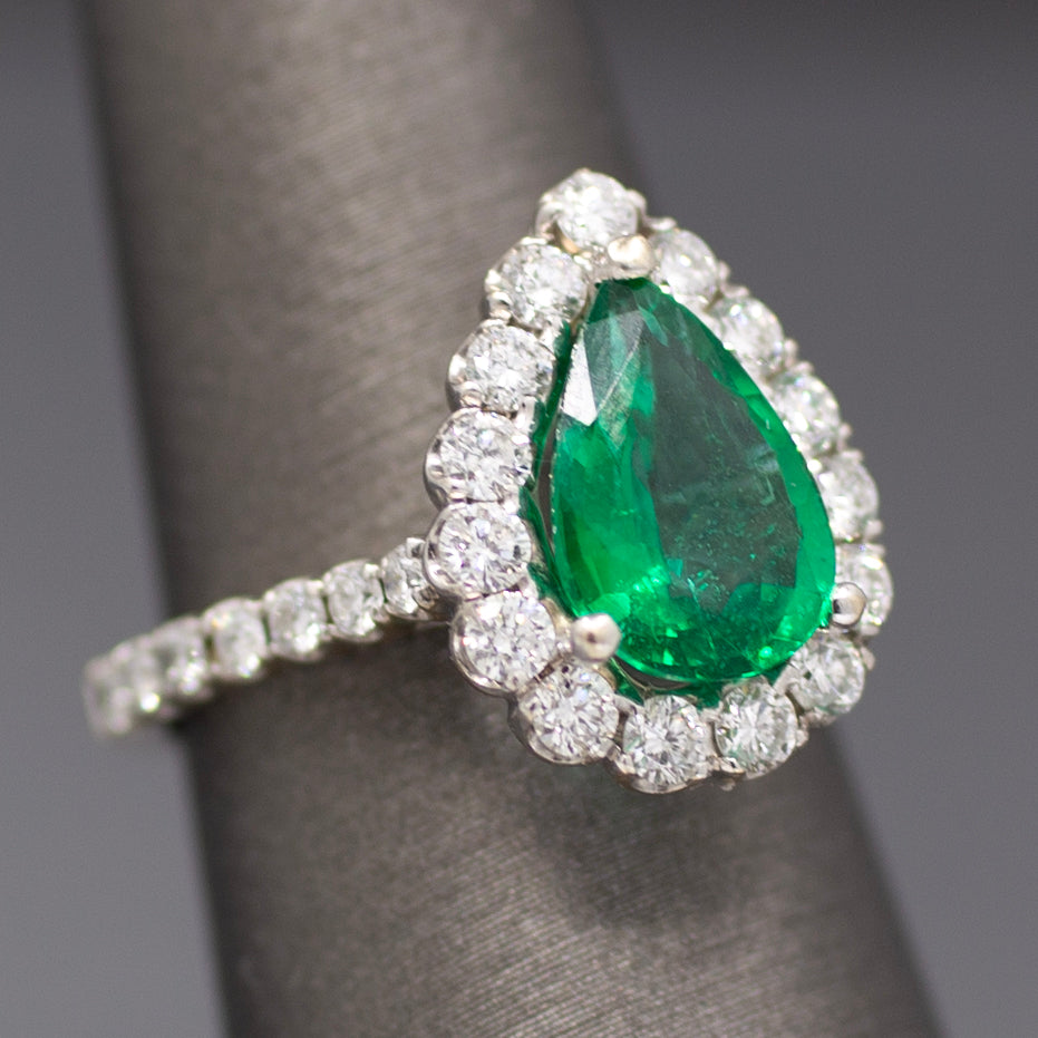 Exquisite GIA Certified Pear Cut Emerald and Diamond Halo Ring in 18k White Gold