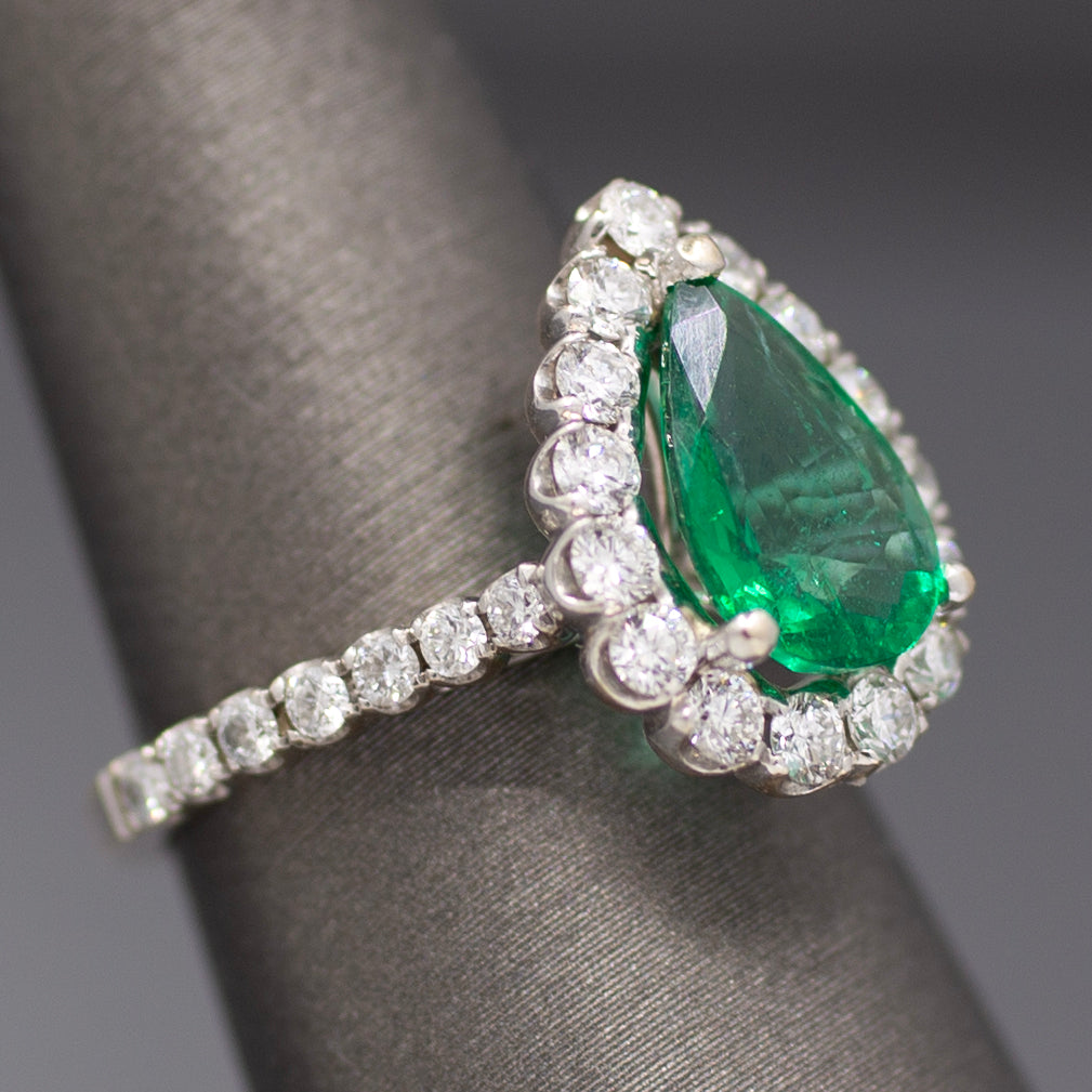 Exquisite GIA Certified Pear Cut Emerald and Diamond Halo Ring in 18k White Gold