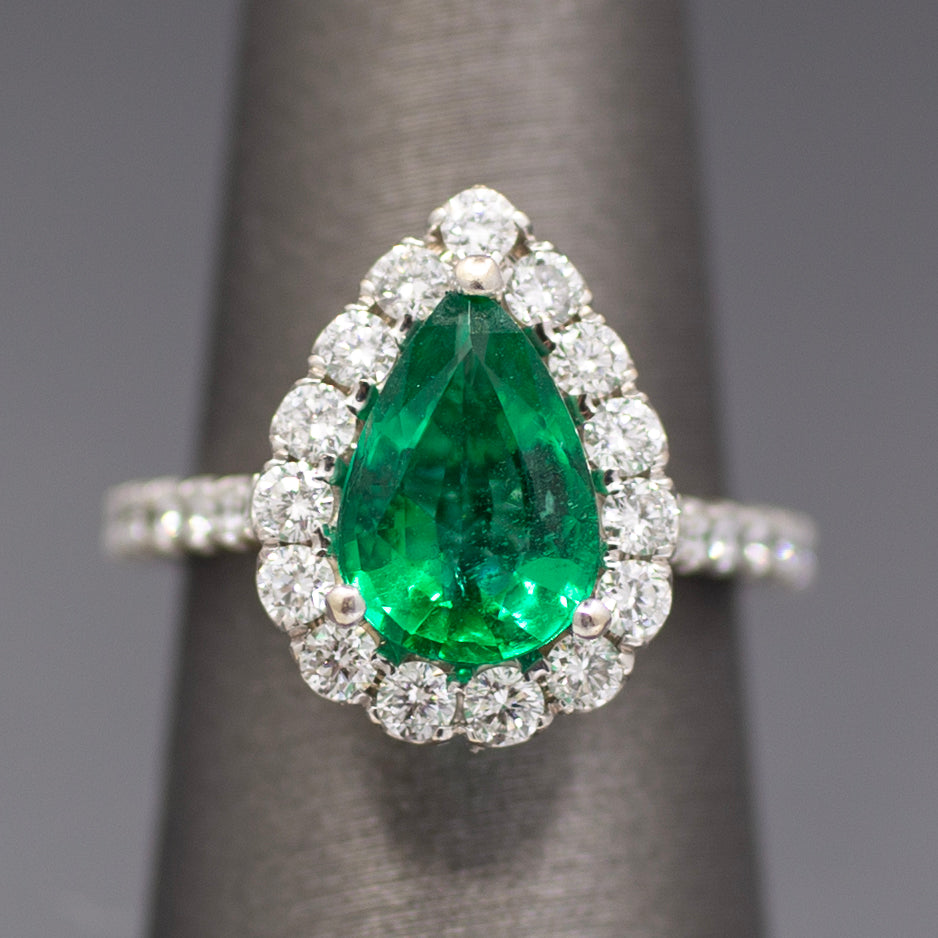 Exquisite GIA Certified Pear Cut Emerald and Diamond Halo Ring in 18k White Gold