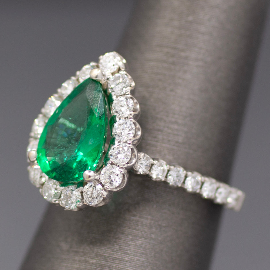 Exquisite GIA Certified Pear Cut Emerald and Diamond Halo Ring in 18k White Gold
