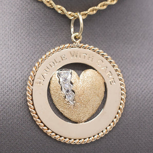 Handle with Care Broken Diamond Heart Pendant Medallion in 14k Yellow Gold