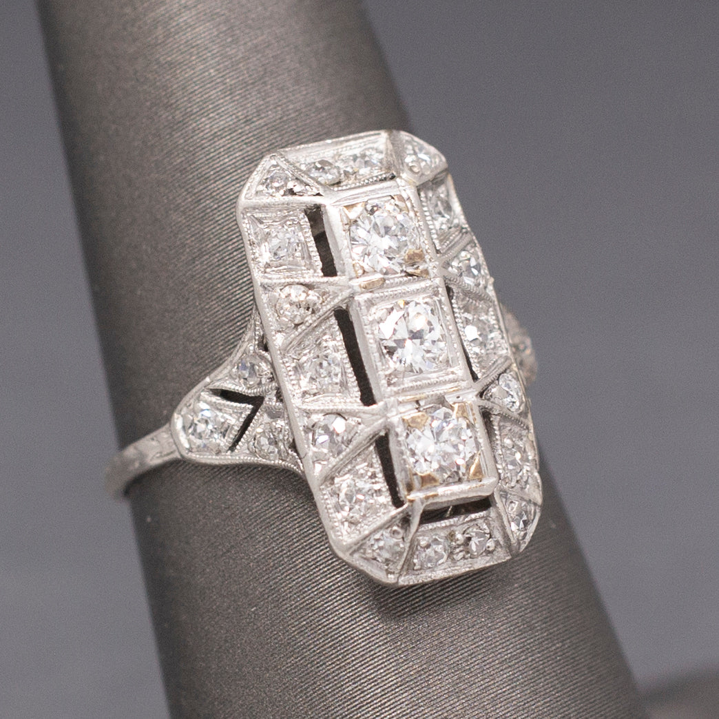 Excellent Art Deco Three Stone Elongated Cocktail Ring in Platinum