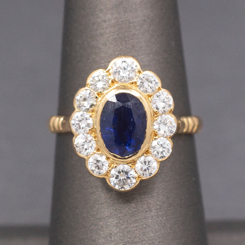Gorgeous Bezel Set Blue Sapphire and Diamond Ring in 14k Yellow Gold