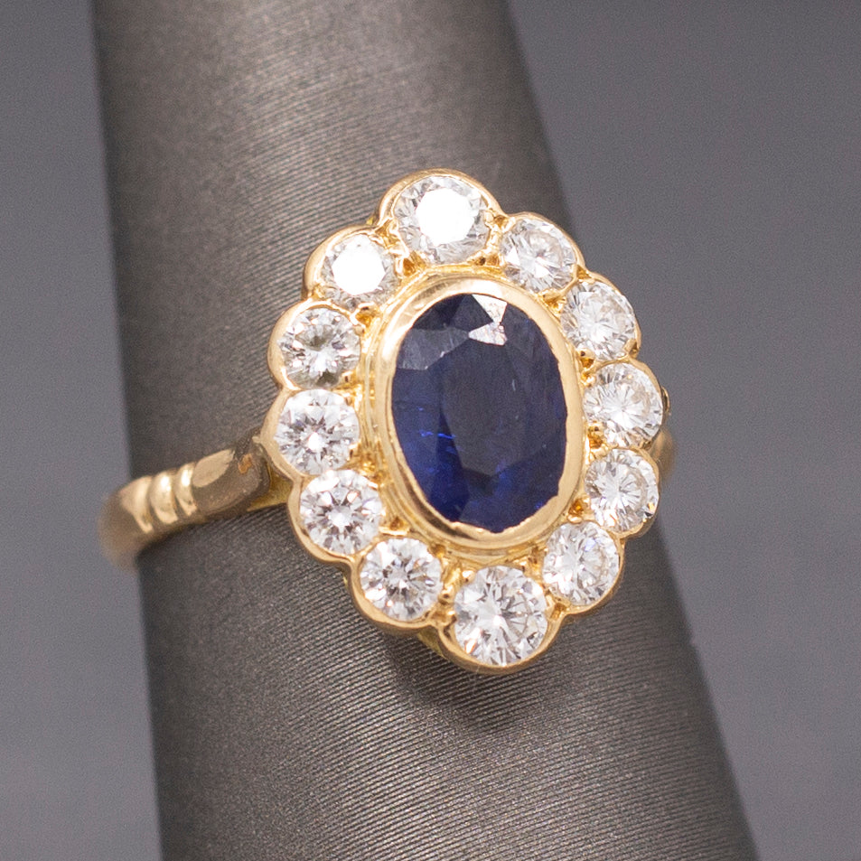 Gorgeous Bezel Set Blue Sapphire and Diamond Ring in 14k Yellow Gold
