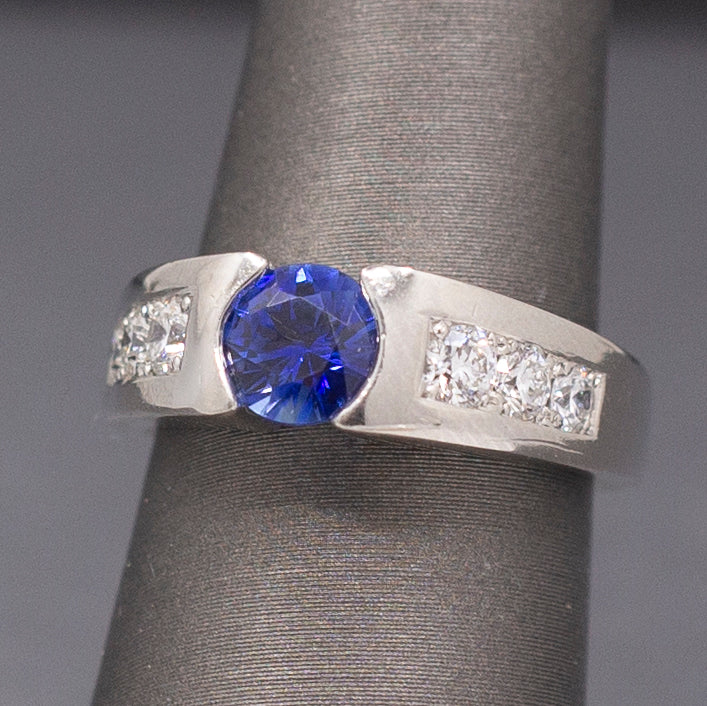 Stunning Vivid Blue Sapphire and Channel Set Diamond Ring in Platinum