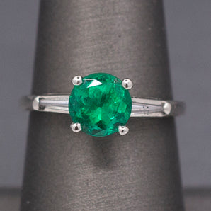 Vintage Natural Round Emerald and Baguette Diamond Ring in Platinum