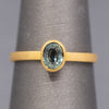 Handcrafted Bezel Set Oval Teal Green Sapphire Solitaire Ring in 18k Yellow Gold