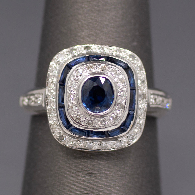 Vintage Blue Sapphire and Diamond Double Halo Bezel Set Oval Ring in 14k White Gold