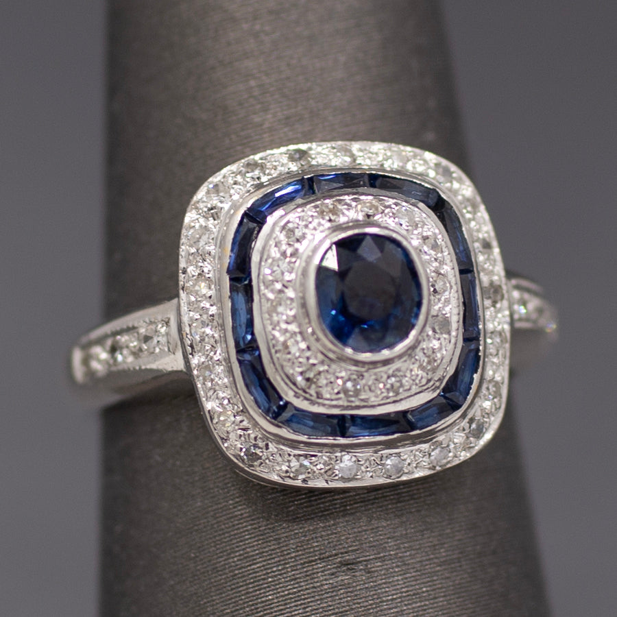 Vintage Blue Sapphire and Diamond Double Halo Bezel Set Oval Ring in 14k White Gold
