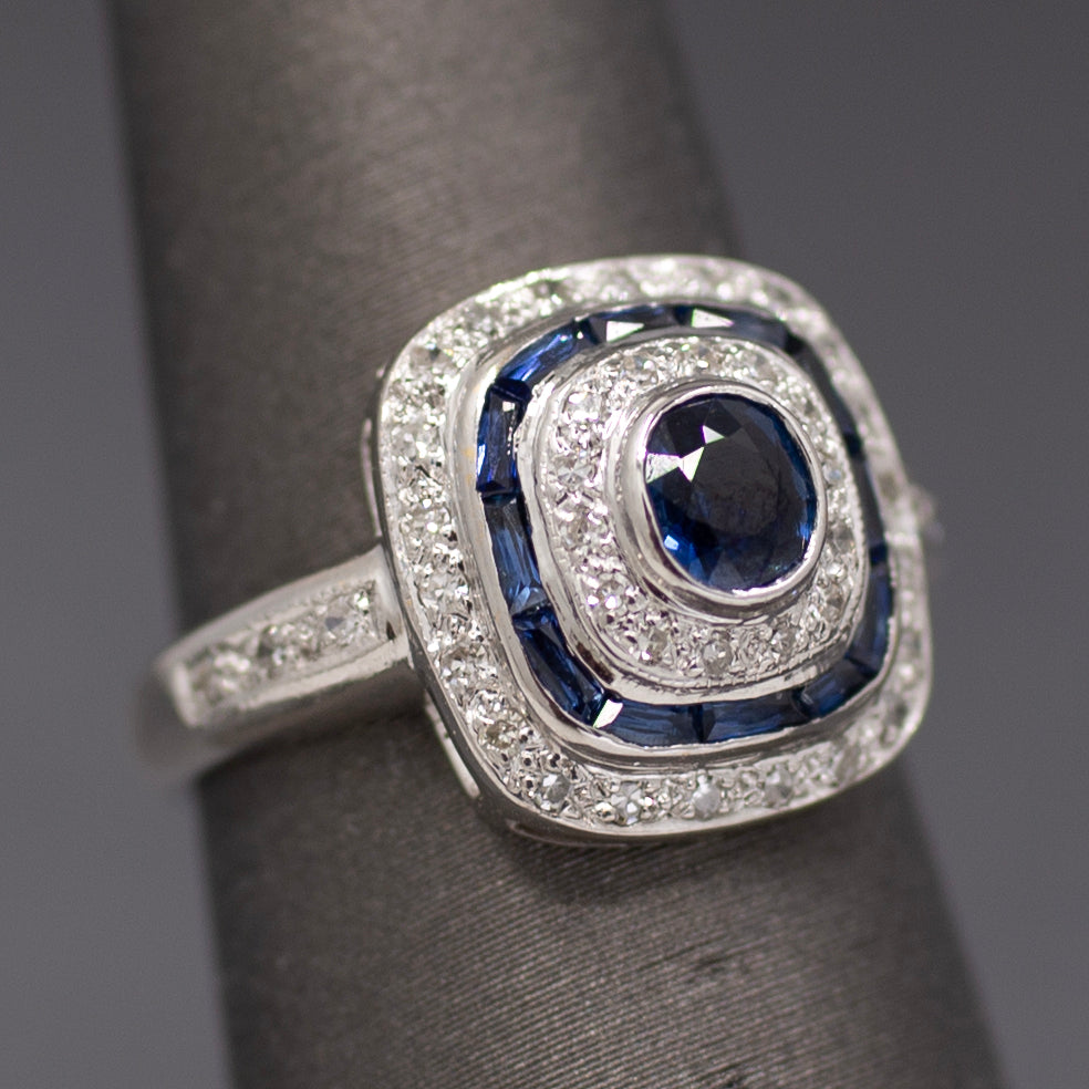 Vintage Blue Sapphire and Diamond Double Halo Bezel Set Oval Ring in 14k White Gold