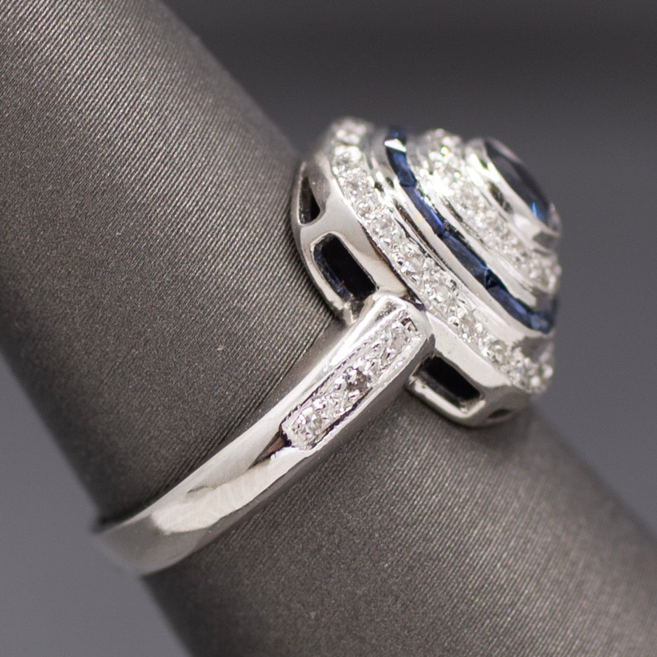 Vintage Blue Sapphire and Diamond Double Halo Bezel Set Oval Ring in 14k White Gold