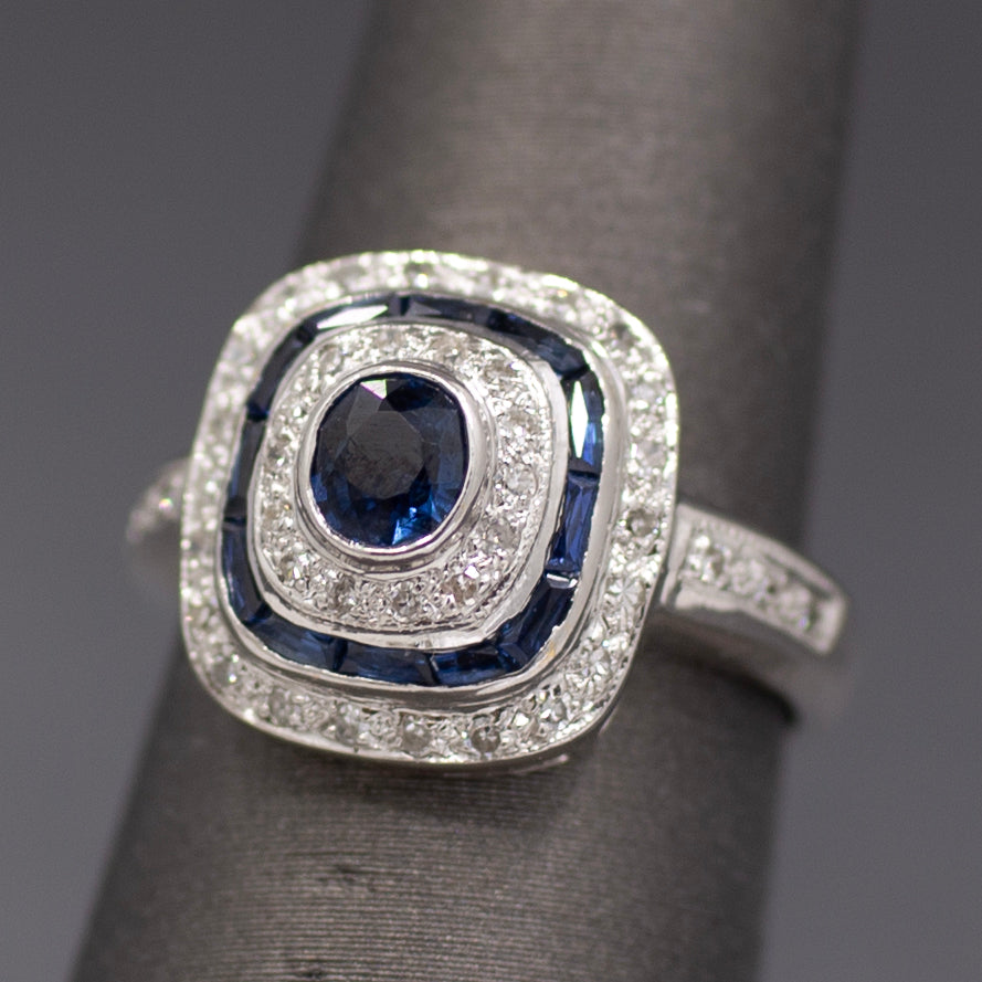 Vintage Blue Sapphire and Diamond Double Halo Bezel Set Oval Ring in 14k White Gold