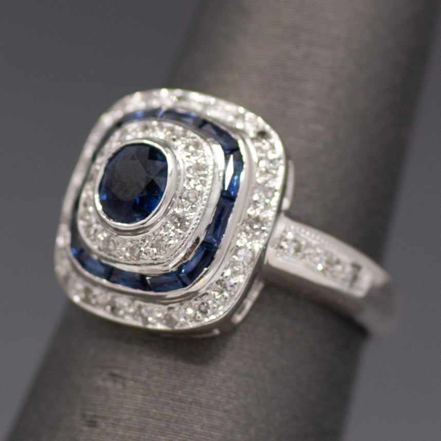Vintage Blue Sapphire and Diamond Double Halo Bezel Set Oval Ring in 14k White Gold