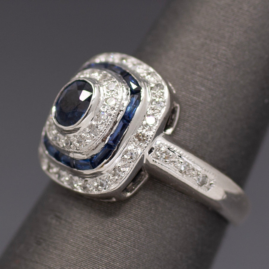 Vintage Blue Sapphire and Diamond Double Halo Bezel Set Oval Ring in 14k White Gold