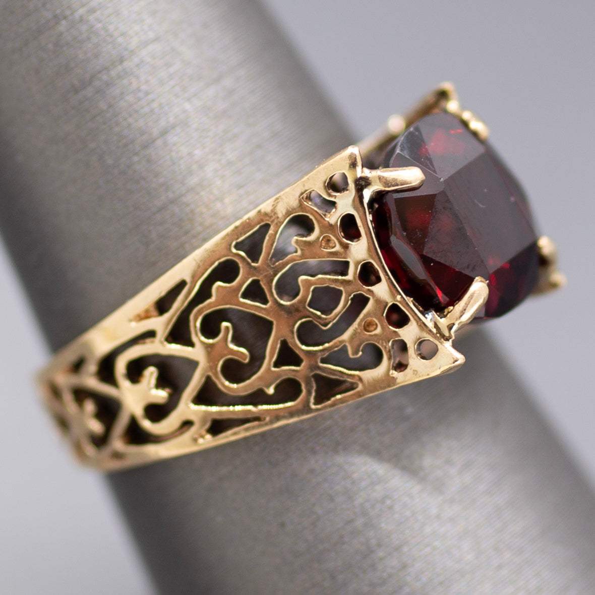Vintage Garnet Pierced Band Solitaire Ring in 14k Yellow Gold