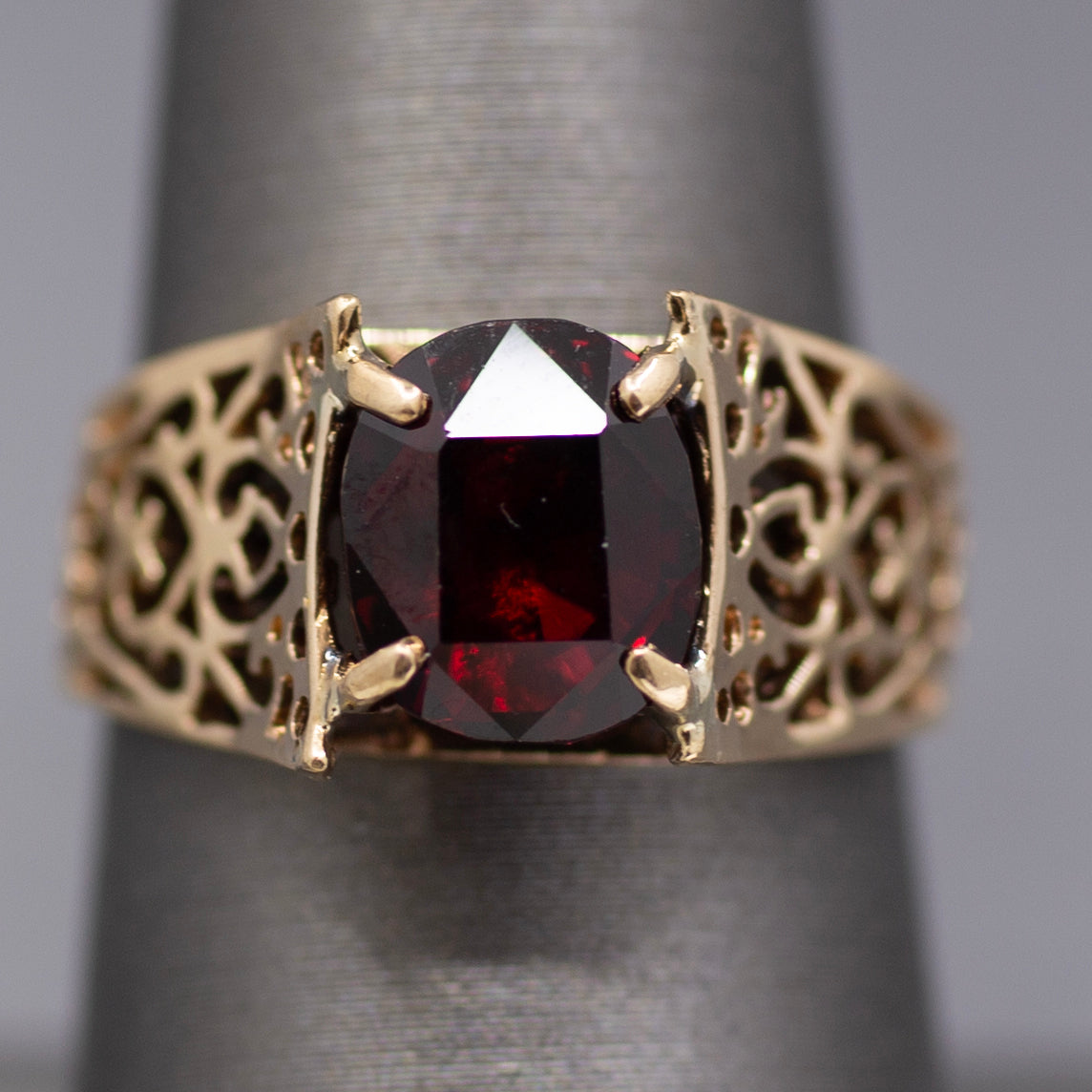 Vintage Garnet Pierced Band Solitaire Ring in 14k Yellow Gold