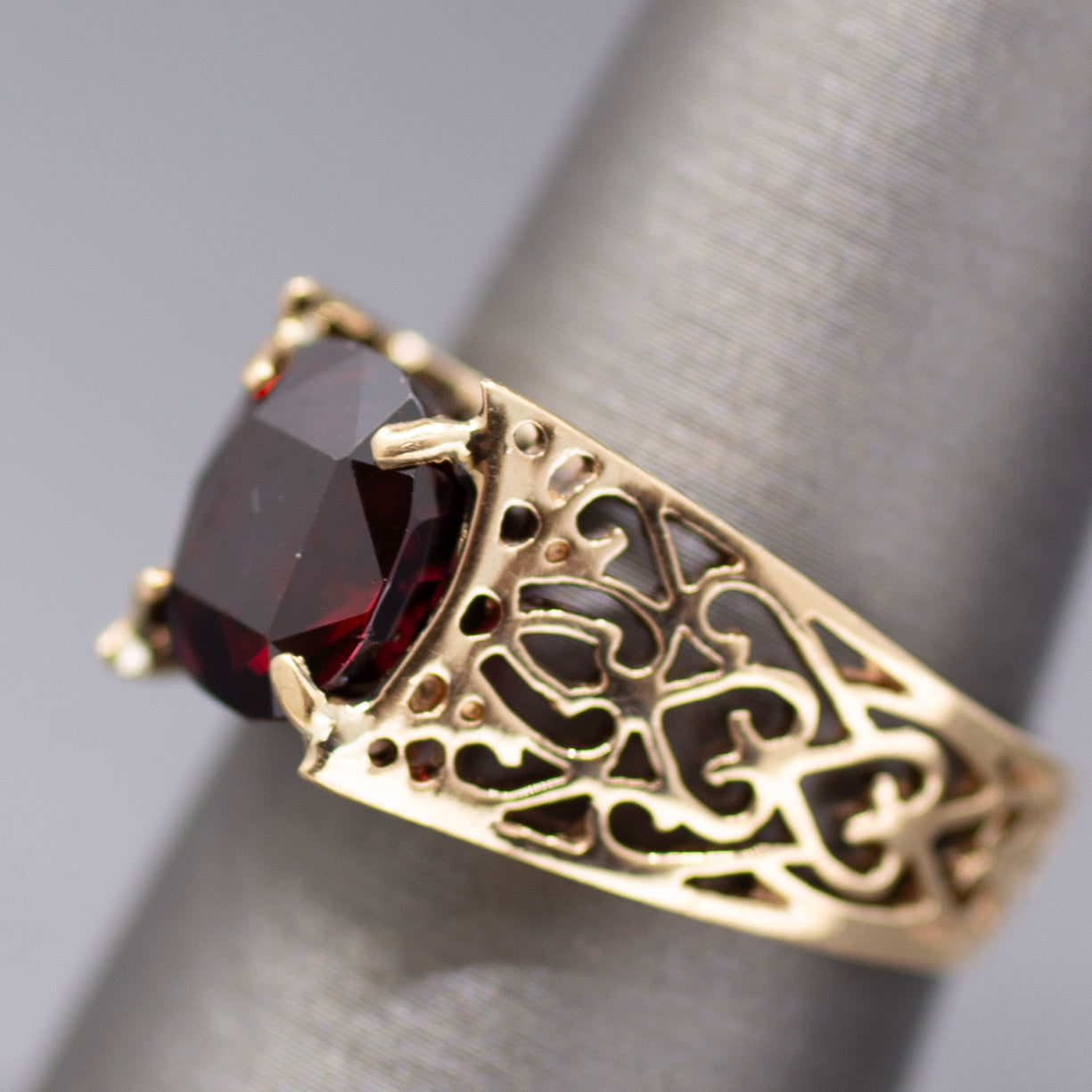 Vintage Garnet Pierced Band Solitaire Ring in 14k Yellow Gold