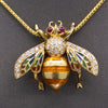 Exquisite Diamond Ruby and Enamel Articulated Bee Pendant in 18k Yellow Gold