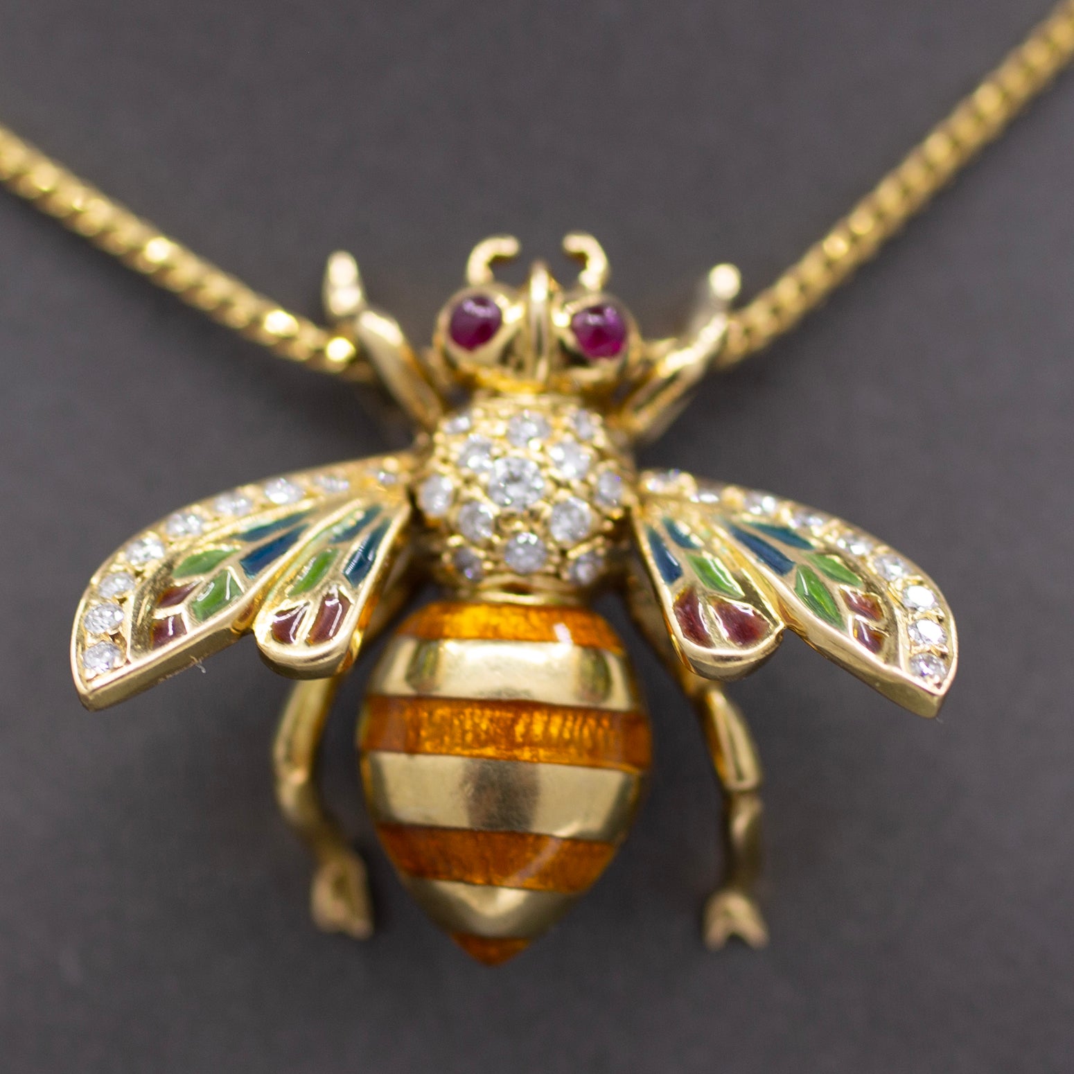 Exquisite Diamond Ruby and Enamel Articulated Bee Pendant in 18k Yellow Gold