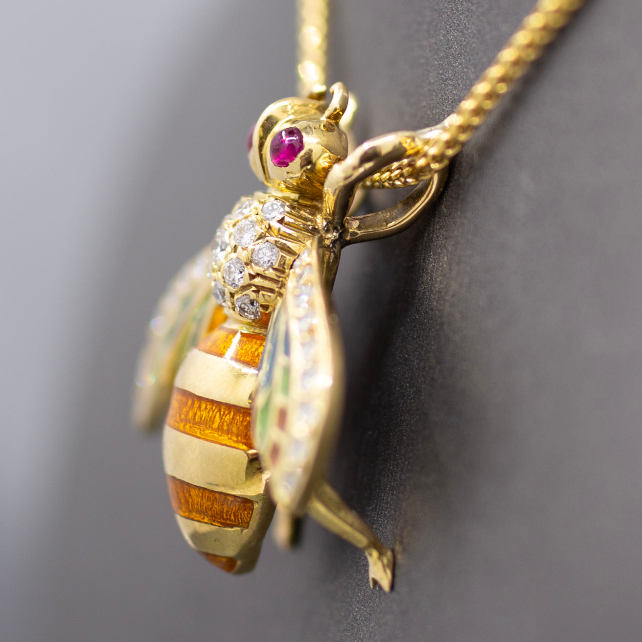 Exquisite Diamond Ruby and Enamel Articulated Bee Pendant in 18k Yellow Gold