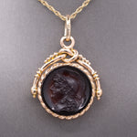 Antique Victorian Spinning Pressed Glass Cameo and Onyx Locket in 14k Rose Gold