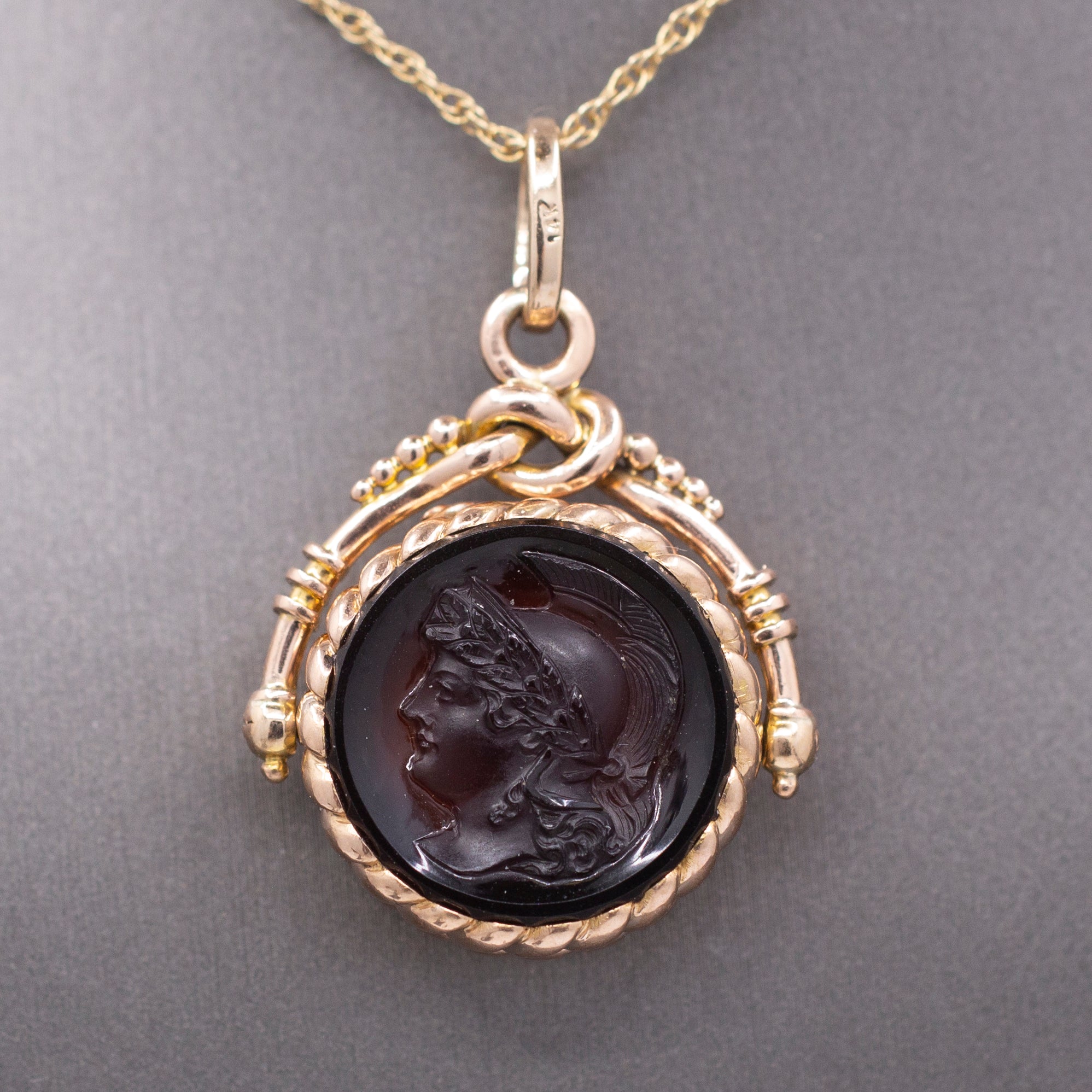 Antique Victorian Spinning Pressed Glass Cameo and Onyx Locket in 14k Rose Gold