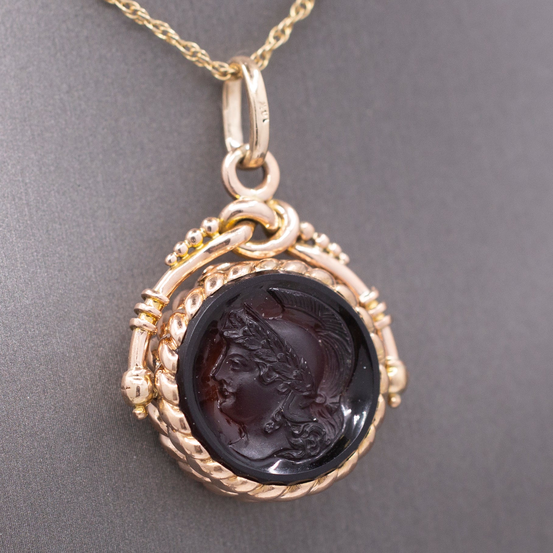 Antique Victorian Spinning Pressed Glass Cameo and Onyx Locket in 14k Rose Gold