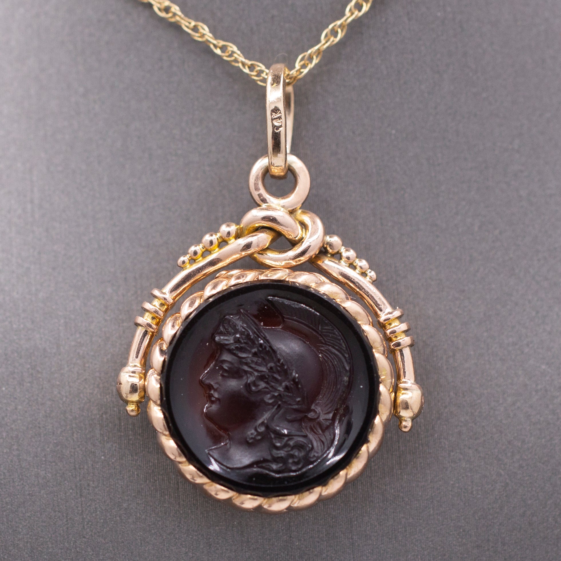 Antique Victorian Spinning Pressed Glass Cameo and Onyx Locket in 14k Rose Gold