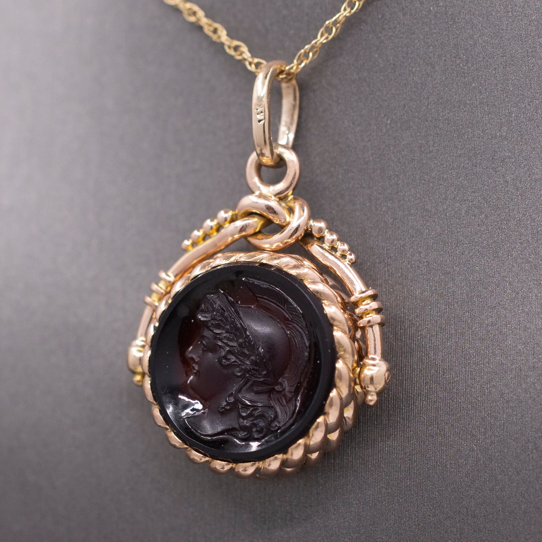 Antique Victorian Spinning Pressed Glass Cameo and Onyx Locket in 14k Rose Gold