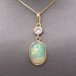 Exquisite Ethiopian Opal and Diamond Bezel Set Pendant Necklace in 14k Yellow Gold
