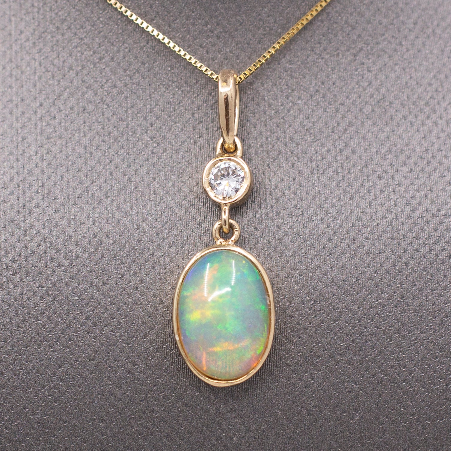 Exquisite Ethiopian Opal and Diamond Bezel Set Pendant Necklace in 14k Yellow Gold