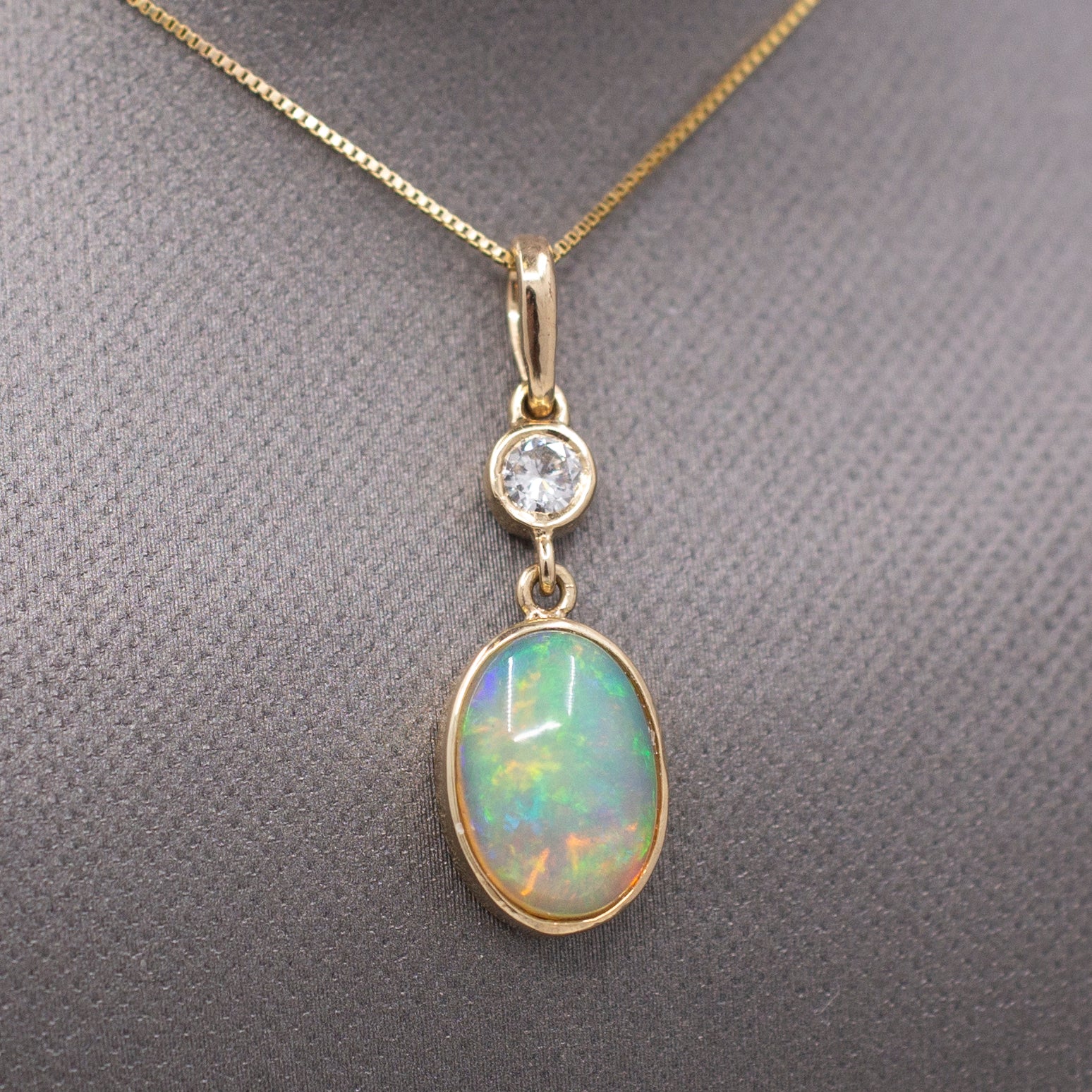 Exquisite Ethiopian Opal and Diamond Bezel Set Pendant Necklace in 14k Yellow Gold