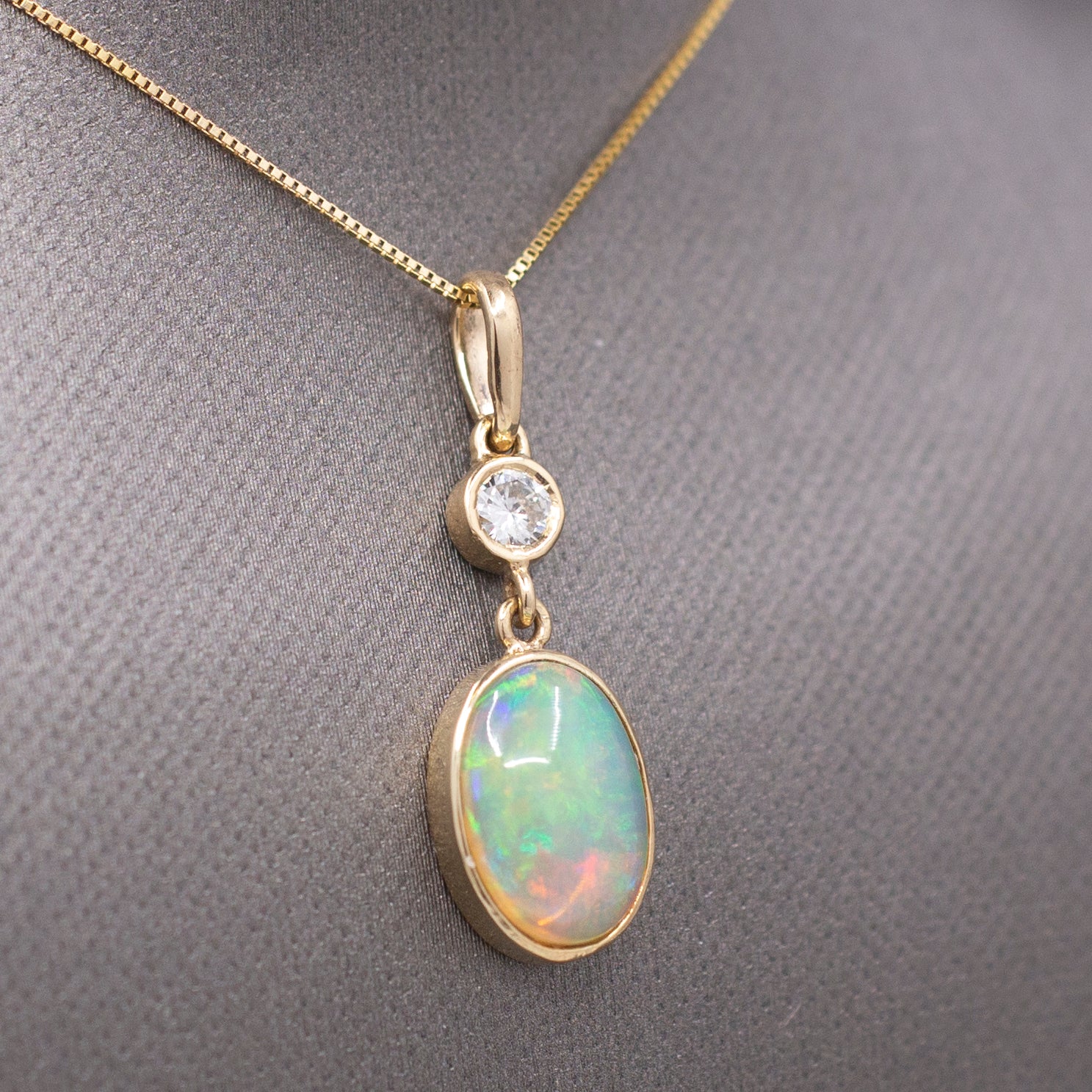 Exquisite Ethiopian Opal and Diamond Bezel Set Pendant Necklace in 14k Yellow Gold