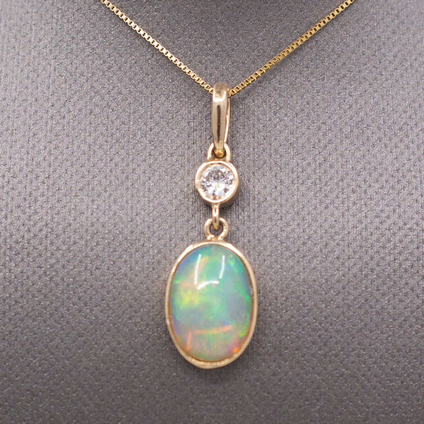 Exquisite Ethiopian Opal and Diamond Bezel Set Pendant Necklace in 14k Yellow Gold