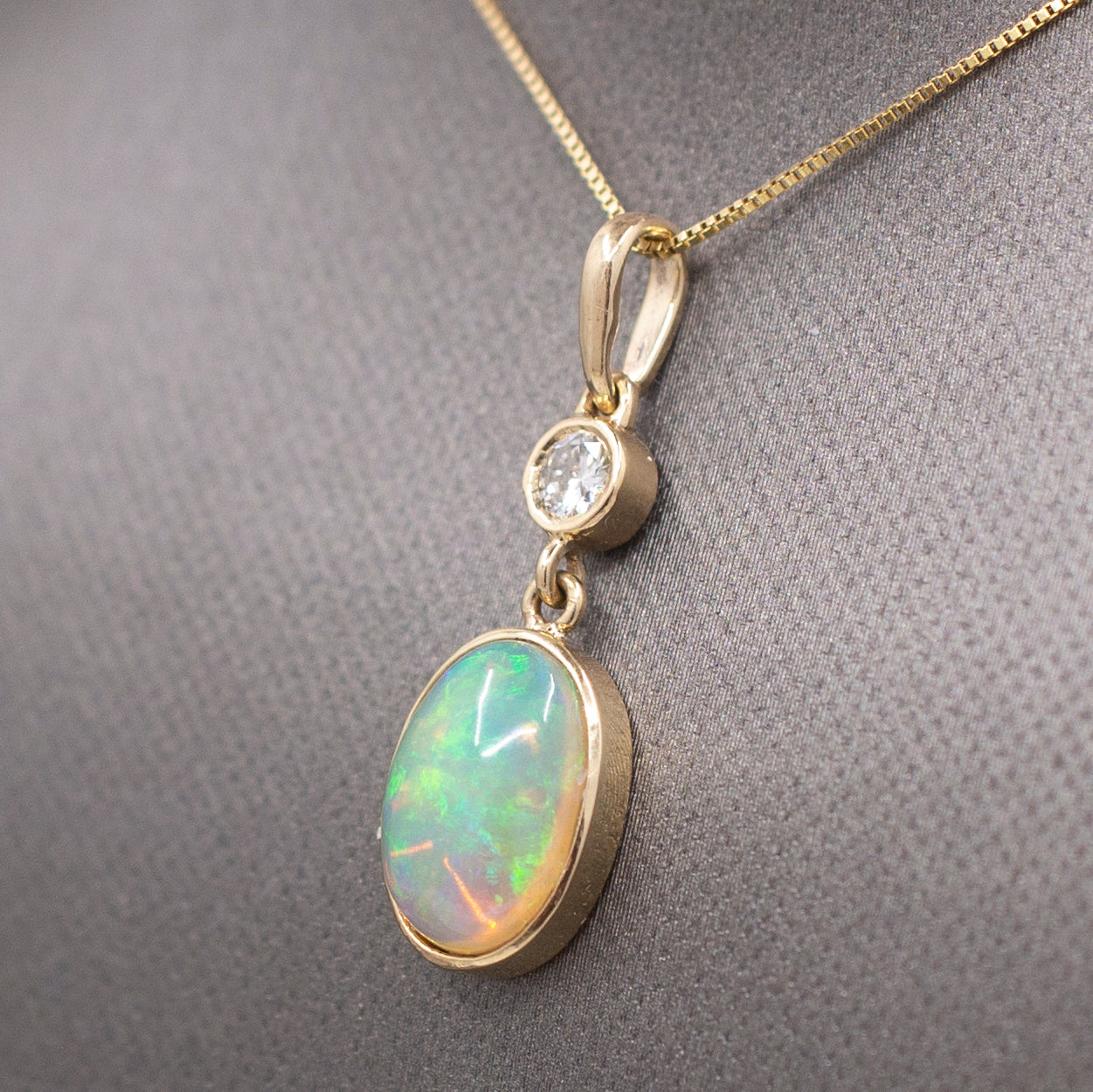 Exquisite Ethiopian Opal and Diamond Bezel Set Pendant Necklace in 14k Yellow Gold