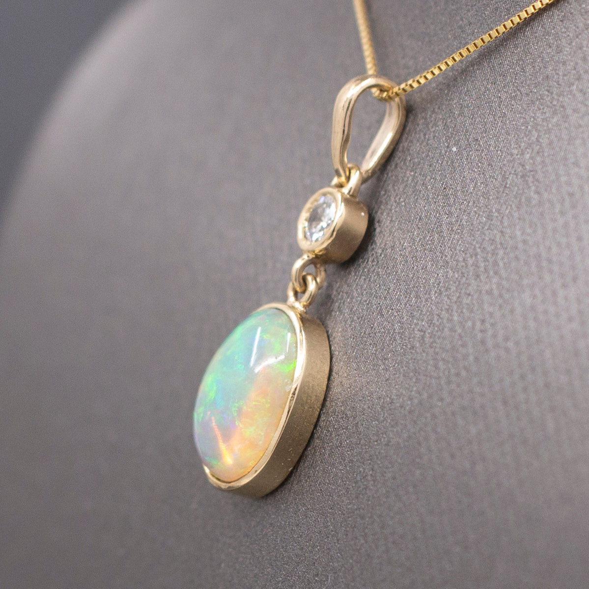 Exquisite Ethiopian Opal and Diamond Bezel Set Pendant Necklace in 14k Yellow Gold
